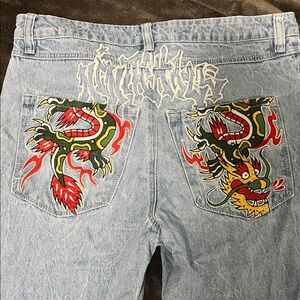 Edgy Light Blue Jeans with Dragon Design